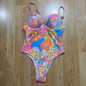 One piece neon bathing suit.